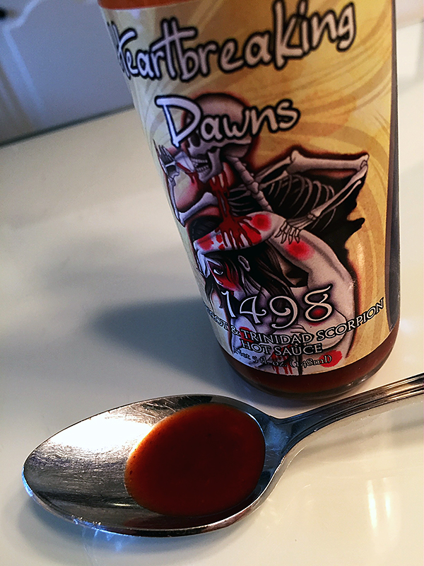 1498 Trinidad Scorpion Hot Sauce on a spoon