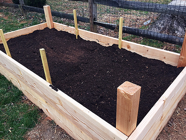 photo: raised beds getting filled